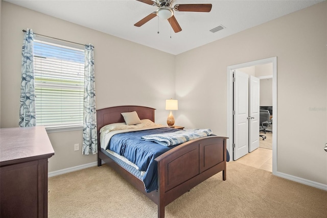 226 Tapa Parish Run, Bradenton, FL 34212 - bedroom featuring light carpet and a ceiling fan
