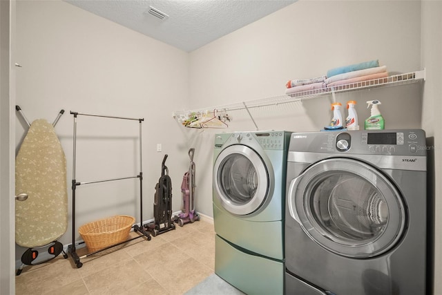 226 Tapa Parish Run, Bradenton, FL 34212 - laundry area with separate washer and dryer and light tile patterned flooring