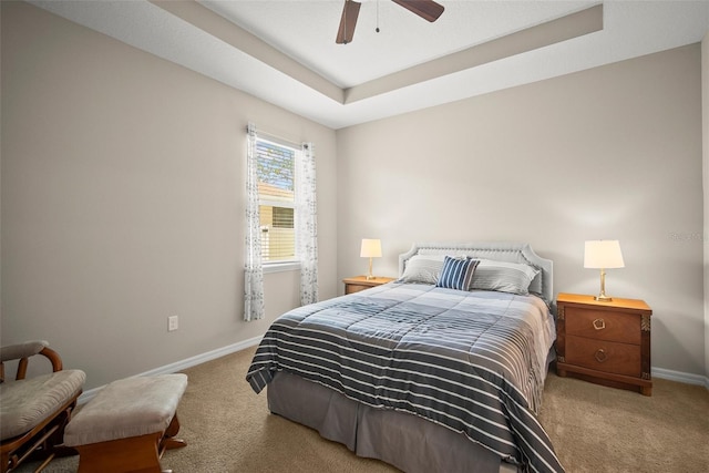 226 Tapa Parish Run, Bradenton, FL 34212 - carpeted bedroom featuring a ceiling fan and a raised ceiling