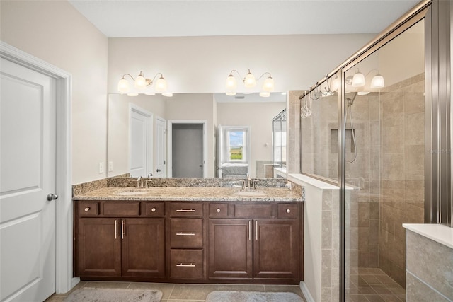 226 Tapa Parish Run, Bradenton, FL 34212 - bathroom with a shower stall, double vanity, ensuite bathroom, and tile patterned flooring