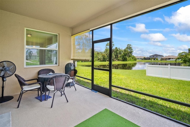 226 Tapa Parish Run, Bradenton, FL 34212 - sunroom / solarium featuring a water view
