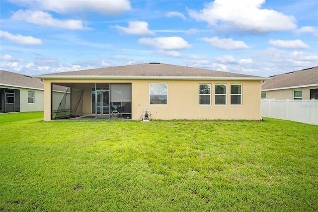 226 Tapa Parish Run, Bradenton, FL 34212 - rear view of property with a sunroom and stucco siding