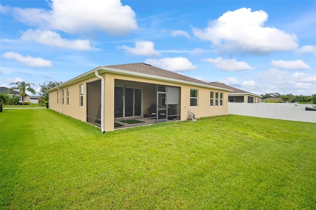 226 Tapa Parish Run, Bradenton, FL 34212 - rear view of house featuring a sunroom and stucco siding