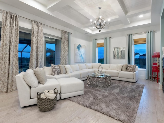5630 Inspiration Ter, Bradenton, FL 34210 - living room featuring a chandelier, coffered ceiling, wood finished floors, beamed ceiling, and recessed lighting