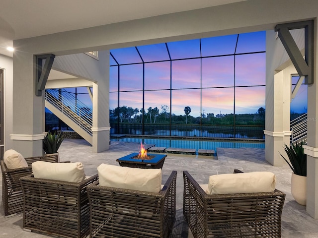 5630 Inspiration Ter, Bradenton, FL 34210 - view of patio / terrace featuring a fire pit and a water view