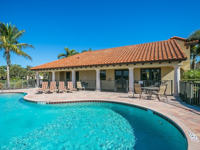 5630 Inspiration Ter, Bradenton, FL 34210 - community pool featuring a patio and french doors