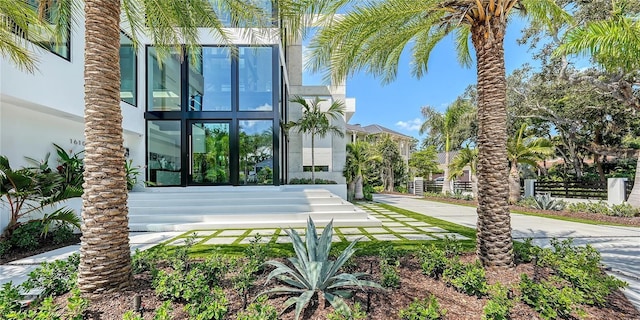 1610 N Lodge Dr, Sarasota, FL 34239 - property entrance featuring stucco siding