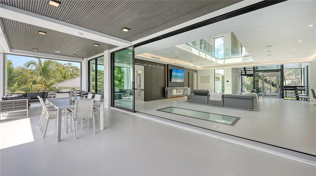 1610 N Lodge Dr, Sarasota, FL 34239 - interior space with outdoor dining space and an outdoor living space