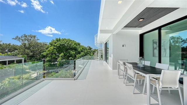 1610 N Lodge Dr, Sarasota, FL 34239 - balcony with outdoor dining area