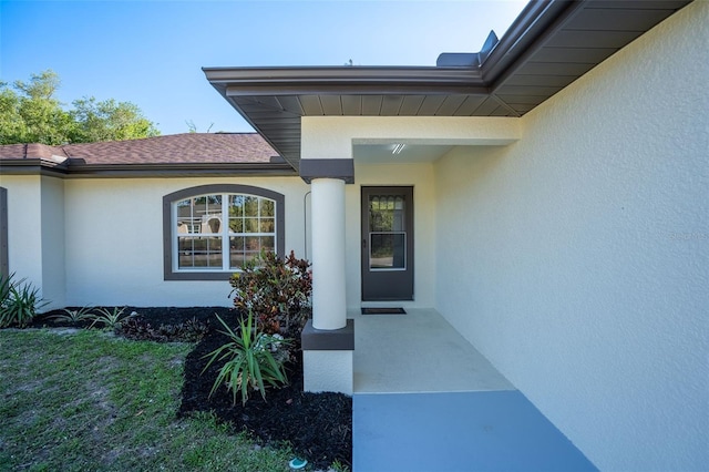 2405 Mistleto Ln, North Port, FL 34286 - view of exterior entry featuring stucco siding