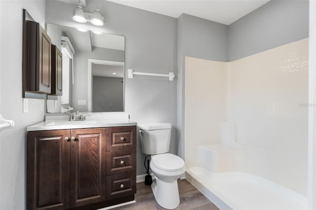 2405 Mistleto Ln, North Port, FL 34286 - bathroom featuring wood finished floors, vanity, and a shower