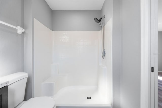 2405 Mistleto Ln, North Port, FL 34286 - bathroom featuring a shower and toilet