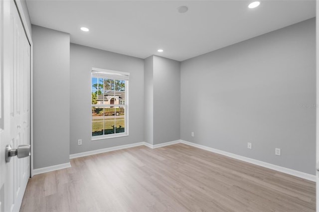2405 Mistleto Ln, North Port, FL 34286 - unfurnished room featuring light wood finished floors and recessed lighting