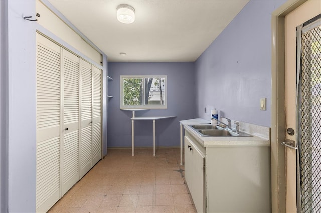 2850 Bon Air Ave, Sarasota, FL 34234 - laundry room featuring cabinet space, hookup for a washing machine, and light floors