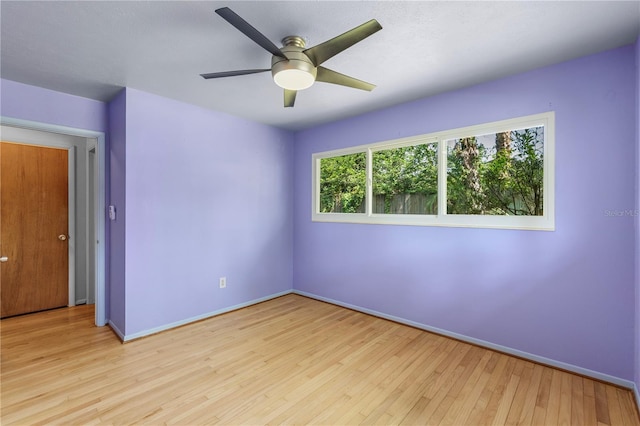 2850 Bon Air Ave, Sarasota, FL 34234 - empty room with wood finished floors and ceiling fan