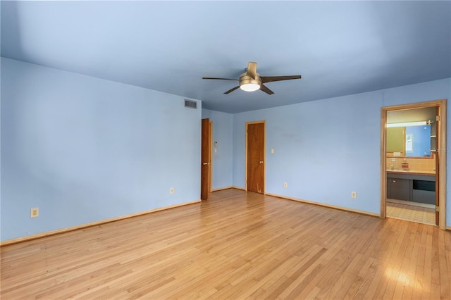 2850 Bon Air Ave, Sarasota, FL 34234 - spare room featuring a ceiling fan and light wood-style flooring