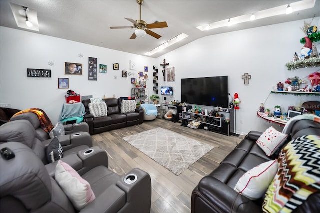 3957 Proctor Rd, Sarasota, FL 34233 - living area with lofted ceiling, ceiling fan, and wood finished floors