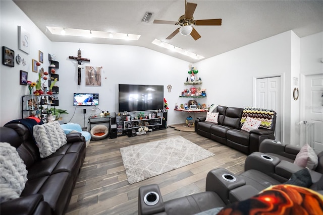 3957 Proctor Rd, Sarasota, FL 34233 - living room with ceiling fan, lofted ceiling, and wood finished floors