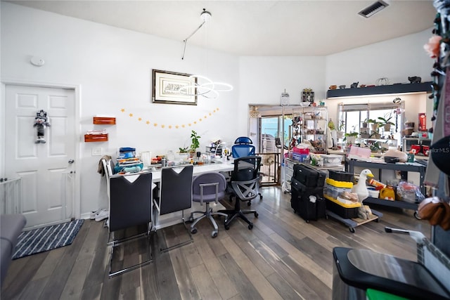 3957 Proctor Rd, Sarasota, FL 34233 - dining room featuring wood finished floors, an office area, and a chandelier