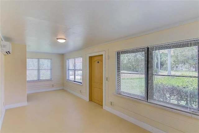 408 3rd Ave E Unit A, B & C, Bradenton, FL 34208 - empty room featuring an AC wall unit and light colored carpet