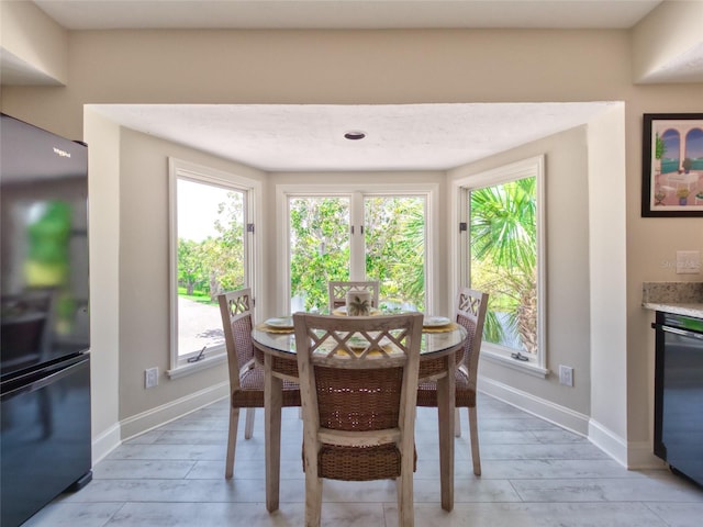 123 Tidy Island Blvd, Bradenton, FL 34210 - dining area with baseboards