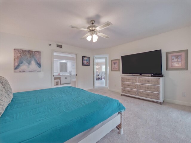 123 Tidy Island Blvd, Bradenton, FL 34210 - bedroom featuring ensuite bathroom, light carpet, and ceiling fan