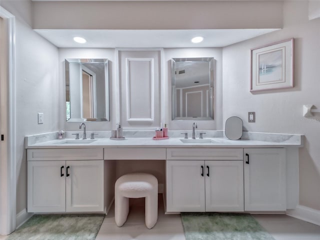 123 Tidy Island Blvd, Bradenton, FL 34210 - full bath featuring double vanity and baseboards