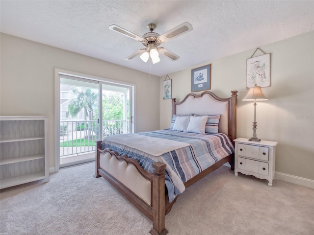 123 Tidy Island Blvd, Bradenton, FL 34210 - carpeted bedroom featuring access to outside, a textured ceiling, and a ceiling fan