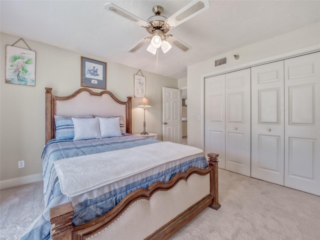 123 Tidy Island Blvd, Bradenton, FL 34210 - bedroom with light carpet, a closet, and ceiling fan
