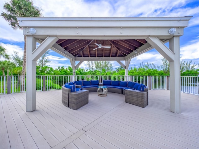 123 Tidy Island Blvd, Bradenton, FL 34210 - deck with a gazebo, an outdoor living space, and a ceiling fan