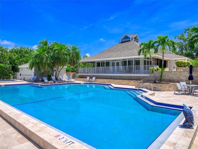 123 Tidy Island Blvd, Bradenton, FL 34210 - community pool featuring a patio