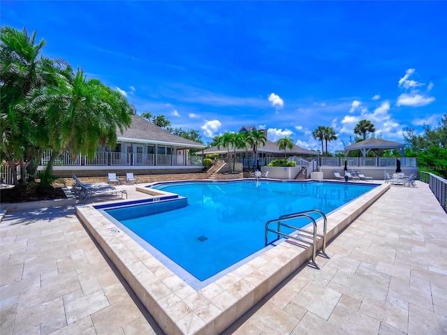 123 Tidy Island Blvd, Bradenton, FL 34210 - community pool with a gazebo and a patio