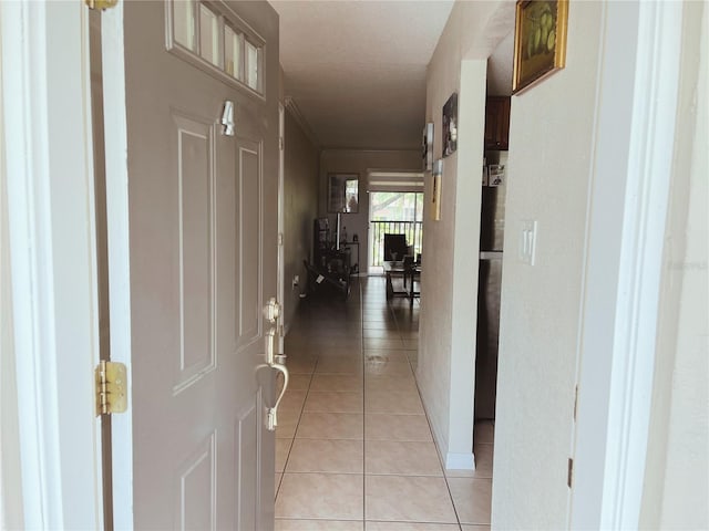 900 La Costa Cir Unit 4, Sarasota, FL 34237 - hallway with light tile patterned floors