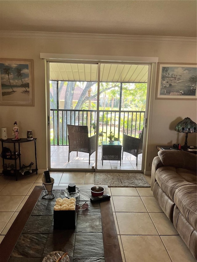 900 La Costa Cir Unit 4, Sarasota, FL 34237 - tiled living room with crown molding