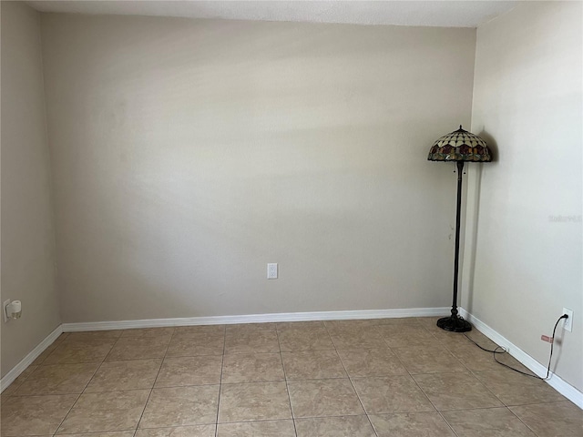900 La Costa Cir Unit 4, Sarasota, FL 34237 - spare room featuring baseboards