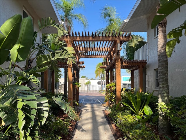 900 La Costa Cir Unit 4, Sarasota, FL 34237 - view of home's community with a pergola