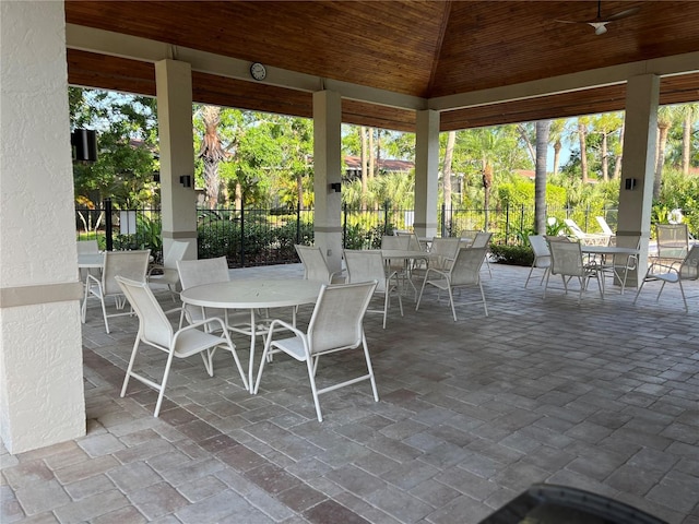 900 La Costa Cir Unit 4, Sarasota, FL 34237 - view of patio featuring outdoor dining area and ceiling fan