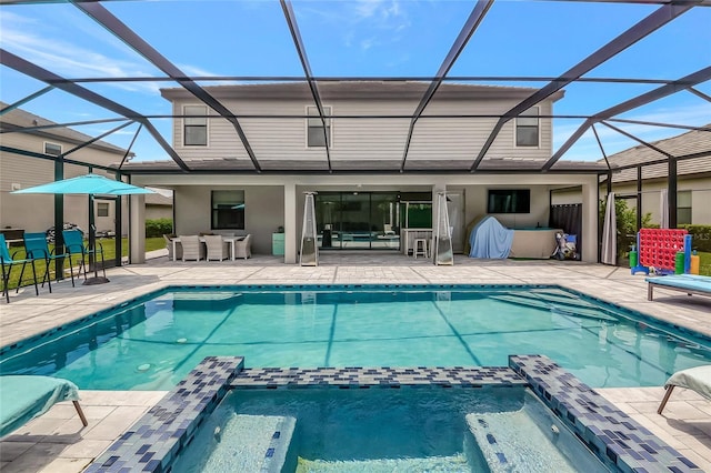 16231 Tradewind Ter, Bradenton, FL 34211 - view of pool with a pool with connected hot tub, a patio area, and glass enclosure