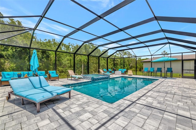 16231 Tradewind Ter, Bradenton, FL 34211 - view of swimming pool featuring outdoor lounge area, a patio, a pool with connected hot tub, and glass enclosure