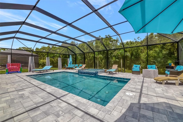 16231 Tradewind Ter, Bradenton, FL 34211 - view of swimming pool with a patio, a pool with connected hot tub, and glass enclosure