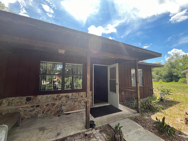 507 Cloudcroft Dr, Deltona, FL 32738 - property entrance featuring board and batten siding