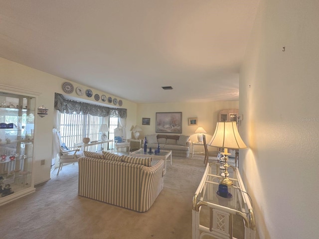 22321 Yonkers Ave, Port Charlotte, FL 33952 - living room featuring light carpet