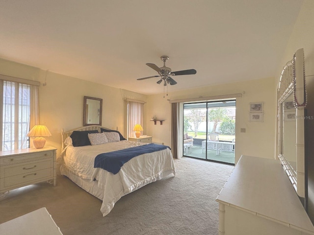 22321 Yonkers Ave, Port Charlotte, FL 33952 - bedroom with access to exterior, carpet flooring, and ceiling fan