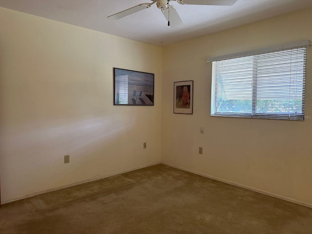 22321 Yonkers Ave, Port Charlotte, FL 33952 - unfurnished room with a ceiling fan and carpet