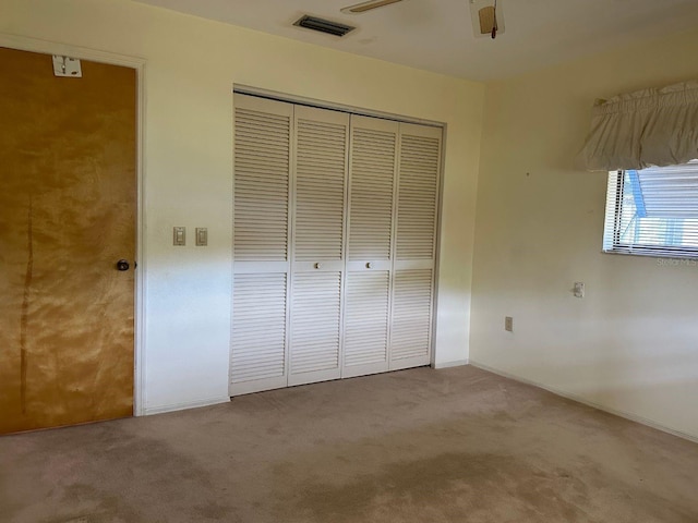 22321 Yonkers Ave, Port Charlotte, FL 33952 - unfurnished bedroom with carpet and a closet