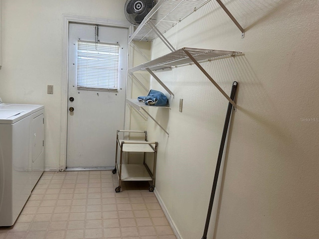 22321 Yonkers Ave, Port Charlotte, FL 33952 - laundry area featuring washing machine and dryer and light floors