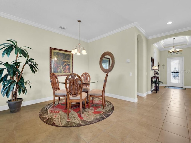 2749 Lambay Ct, Cape Coral, FL 33991 - dining room with a chandelier, arched walkways, ornamental molding, and tile patterned floors