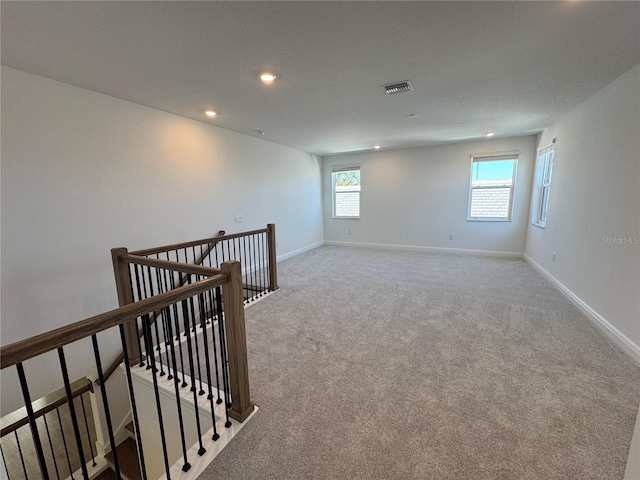 17134 Savory Mist Cir, Bradenton, FL 34211 - unfurnished room featuring light colored carpet and recessed lighting