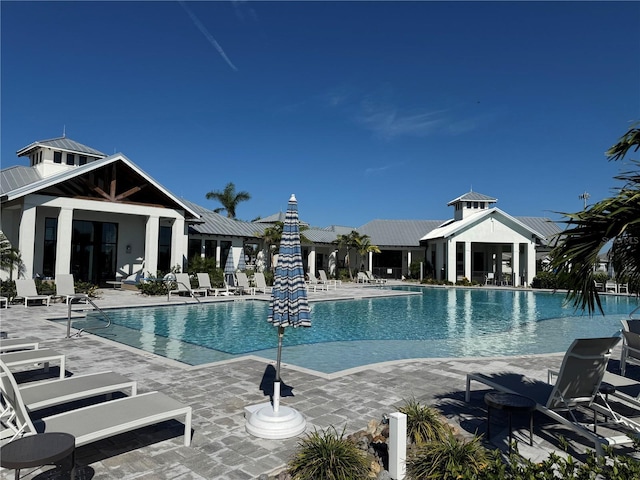 17134 Savory Mist Cir, Bradenton, FL 34211 - community pool with a patio