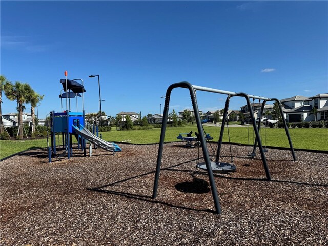17134 Savory Mist Cir, Bradenton, FL 34211 - community jungle gym featuring a yard